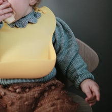 Load image into Gallery viewer, mushie silicone bib - sunshine
